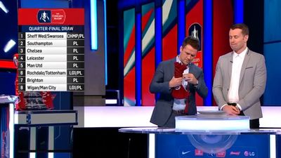 Michael Owen struggles to open bag during FA Cup draw