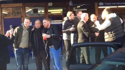 England coach Eddie Jones abused by Scottish fans moments after posing for selfies