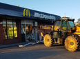 JCB smashes into McDonald’s in failed robbery attempt