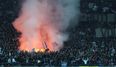 Napoli ultras show hooligans how to greet opposition fans