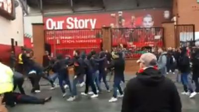 Roma supporters attack Liverpool fans outside Anfield prior to Champions League game