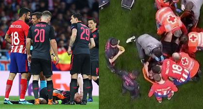 Diego Costa consoles Laurent Koscielny as he’s stretchered off in agony against Atletico Madrid