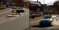 Tour de Yorkshire car almost hits volunteer during race