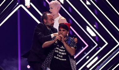 Australian commentator said what everyone was thinking during Eurovision stage invasion