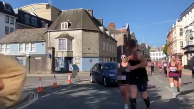 WATCH: Motorist drives into path of runners during Plymouth half marathon