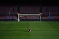 Andres Iniesta sits alone on the Camp Nou pitch until 1am following his final game for Barcelona