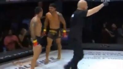 Referee learns that he should never turn his back on the fighters