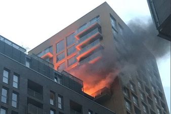 Sixty firefighters battle blaze at high-rise tower block in south London