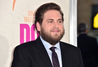 Jonah Hill now has bright pink hair and a tattoo