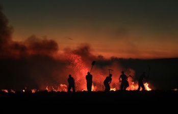 Major incident declared as two Bolton wildfires merge