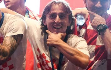 Luka Modrić invites disabled fan up on stage with him during World Cup celebrations