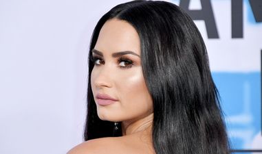 Demi Lovato is “awake and talking” after being admitted to hospital for an apparent overdose