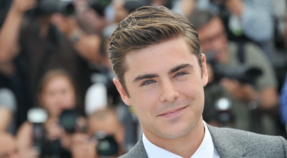 Zac Efron braided his dreadlocks and looks like he belongs in a drum circle at Glastonbury