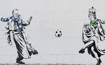 Graffiti outside Ibrox and Parkhead shows the Queen and the Pope playing football