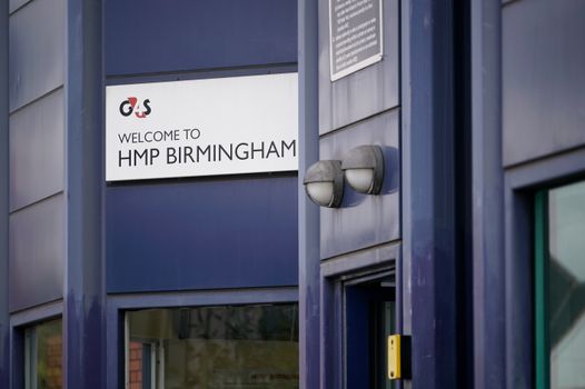 BIRMINGHAM, ENGLAND - AUGUST 20: A welcome to HMP Birmingham sign is displayed outside of Birmingham Prison in Winson Green on August 20, 2018 in Birmingham, England. Birmingham Prison, formerly Winson Green Prison, has been taken over by the government's Ministry of Justice after inspectors said it had fallen into a "state of crisis". Extra staff and a new governor are to be brought in to take over from private firm G4S. (Photo by Christopher Furlong/Getty Images)