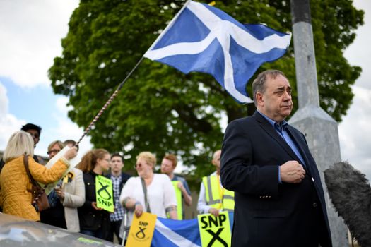 EDINBURGH, SCOTLAND - MAY 18: Alex Salmond MP joins Joanna Cherry, the SNP candidate for Edinburgh South West, on the campaign trail in Broomhouse on May 18, 2017 in Edinburgh, Scotland. Britain goes to the polls on June 8 to elect a new parliament in a general election. (Photo by Jeff J Mitchell/Getty Images)