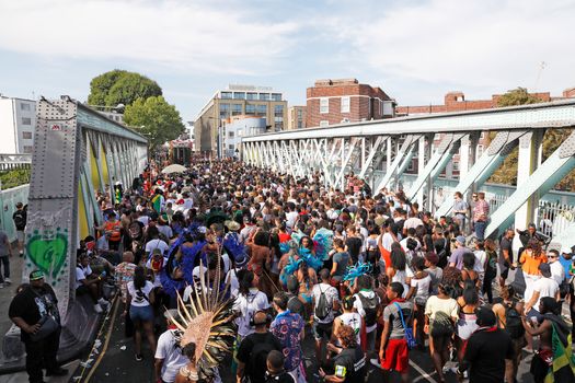 LONDON, ENGLAND - AUGUST 28: General view of the crowd from the Red Bull Music Academy x Mangrove float at Notting Hill Carnival on August 28, 2017 in London, England. (Photo by Tristan Fewings/Getty Images for RedBull)