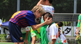 Barcelona youngsters console distraught opposition after tournament win