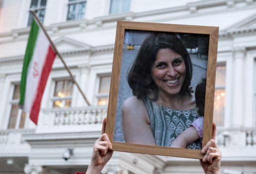 LONDON, ENGLAND - JANUARY 16: Supporters hold a photo of Nazanin Zaghari-Ratcliffe during a vigil for British-Iranian mother, Nazanin Zaghari-Ratcliffe, imprisoned in Tehran outisde the Iranian Embassy on January 16, 2017 in London, England. Charity worker Nazanin Zaghari-Ratcliffe was jailed for five years in September 2016 for allegedly attempting to overthrow the Iranian government. The vigil, being held outside the Iranian Embassy in London marks one year since the Washington Post journalist Jason Rezaian and other US-Iranian dual-nationals were released from prison in Iran. (Photo by Chris J Ratcliffe/Getty Images)