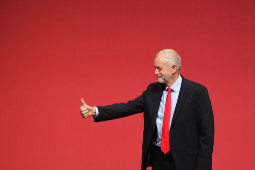 LIVERPOOL, ENGLAND - SEPTEMBER 24: Jeremy Corbyn MP gives the thumbs up to supporters after being announced as the leader of the Labour Party on the eve of the party's annual conference at the ACC on September 24, 2016 in Liverpool, England. The leadership battle between Jeremy Corbyn and MP for Pontypridd Owen Smith, was triggered by Labour MPs who were unhappy with Mr Corbyn's leadership in the run up to the Brexit referendum. (Photo by Christopher Furlong/Getty Images)