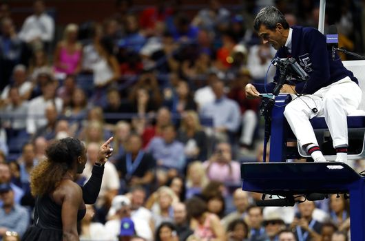 NEW YORK, NY - SEPTEMBER 08: Serena Williams of the United States argues with umpire Carlos Ramos after her defeat in the Women's Singles finals match to Naomi Osaka of Japan on Day Thirteen of the 2018 US Open at the USTA Billie Jean King National Tennis Center on September 8, 2018 in the Flushing neighborhood of the Queens borough of New York City. (Photo by Julian Finney/Getty Images)