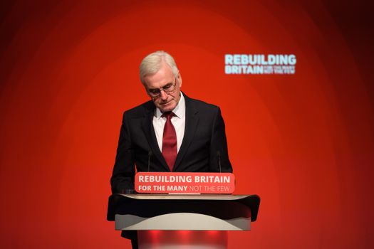 LIVERPOOL, ENGLAND - SEPTEMBER 24: Shadow Chancellor of the Exchequer John McDonnell addresses delegates in the Exhibition Centre Liverpool during day two of the annual Labour Party conference on September 24, 2018 in Liverpool, England. Labour's official slogan for the conference is ?Rebuilding Britain, for the many, not the few?. (Photo by Leon Neal/Getty Images)