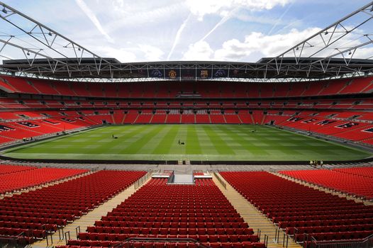 LONDON, UNITED KINGDOM - MAY 24: In this handout image provided by UEFA, final preparations are made to the pitch at Wembley Stadium for the Champions League Final, May 24, 2011 in London, England. The UEFA Champions League final between FC Barcelona and Manchester United FC will be held at Wembley stadium on May 28. (Photo by UEFA via Getty Images)