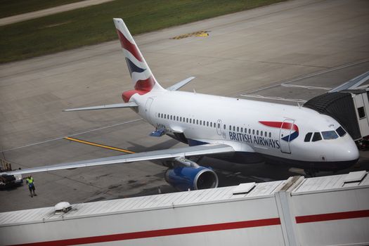 LONDON, ENGLAND - MAY 28: British Airways aircraft on the tarmac at Heathrow Airport Terminal 5 on May 28, 2017 in London, England. Thousands of passengers face a second day of travel disruption after a British Airways IT failure caused the airline to cancel most of its services. (Photo by Jack Taylor/Getty Images) BA