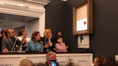 Banksy painting sold for $1.1 million at auction, immediately self-destructs