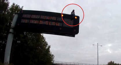 Man brings M1 to a halt for several hours after climbing on top of traffic sign