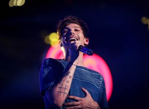 Louis Tomlinson shuns One Direction saying he “used to be in a band”