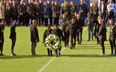 Vichai Srivaddhanaprabha’s family lay wreath on the King Power Stadium pitch