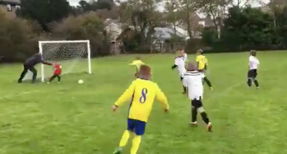 WATCH: Dad pushes son to try and make save in contender for video of the year