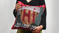 This cushion reveals Jeff Goldblum’s face with a Christmas message and you’re gonna want one