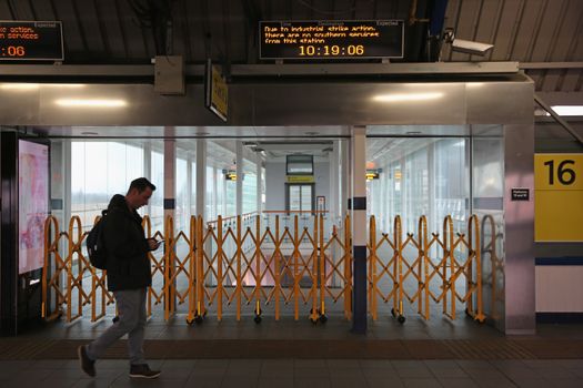 LONDON, ENGLAND - DECEMBER 16: A platform is closed at Clapham Junction due to industrial action on December 16, 2016 in London, England. Commuters across the South of the country are facing a third day of disruption after members of the 'ASLEF', the UK union for train drivers and operators, stage a third day of industrial action. Talks between Aslef and the RMT unions and Southern's parent company Govia Thameslink, broken down after an agreement couldn't be reached.. (Photo by Dan Kitwood/Getty Images)