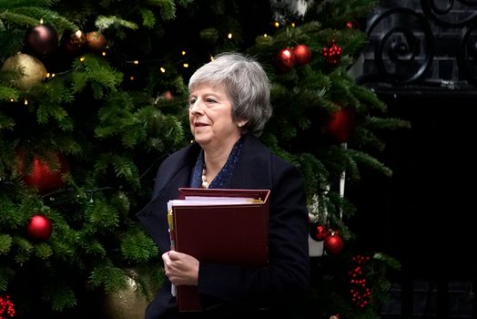 LONDON, ENGLAND - DECEMBER 12: British Prime Minister Theresa May leaves 10 Downing Street for the House of Commons to face Prime Minister's Questions after it was announced that Prime Minister Theresa May will face a vote of no confidence, to take place tonight, on December 12, 2018 in London, England. Sir Graham Brady, the chairman of the 1922 Committee, has received the necessary 48 letters (15% of the parliamentary party) from Conservative MP's that will trigger a vote of no confidence in the Prime Minister. (Photo by Christopher Furlong/Getty Images)