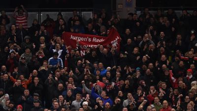 Police investigating after Liverpool fans were hit by coins during Manchester City clash