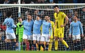 Man City put nine goals Burton Albion in first leg of League Cup semi-final