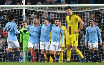 Man City put nine goals Burton Albion in first leg of League Cup semi-final