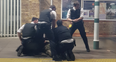 Police taser man with machete at London train station