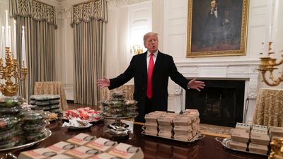 Donald Trump welcomes college football champions to fast food banquet after government shutdown