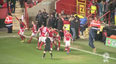 Charlton fan crunches own player during wild goal celebrations