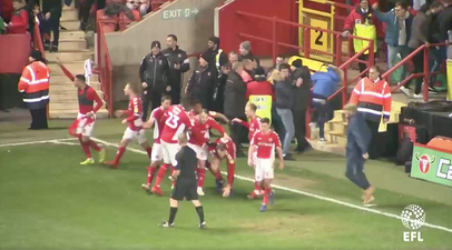 Charlton fan crunches own player during wild goal celebrations