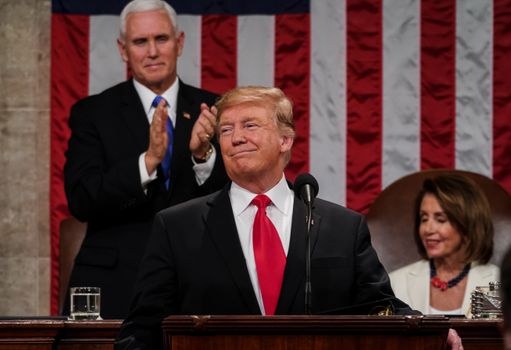 WASHINGTON, DC - FEBRUARY 5: U.S. President Donald Trump, with Speaker Nancy Pelosi and Vice President Mike Pence looking on, delivers the State of the Union address in the chamber of the U.S. House of Representatives at the U.S. Capitol Building on February 5, 2019 in Washington, DC. President Trump's second State of the Union address was postponed one week due to the partial government shutdown. (Photo by Doug Mills-Pool/Getty Images)