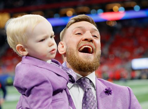 ATLANTA, GA - FEBRUARY 03: Conor McGregor with his son, Conor Jack McGregor Jr., on the field prior to Super Bowl LIII at Mercedes-Benz Stadium on February 3, 2019 in Atlanta, Georgia. (Photo by Kevin C. Cox/Getty Images)