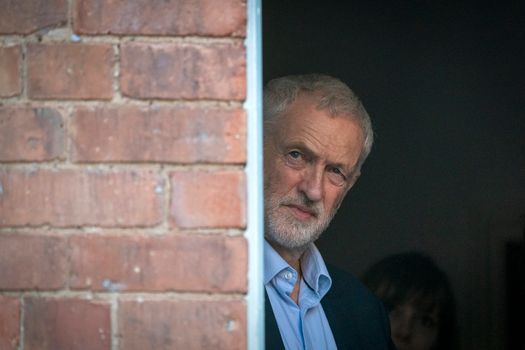 BEESTON, ENGLAND - FEBRUARY 23: Labour Party leader, Jeremy Corbyn waits to speak during a rally in the garden at Voluntary Action Broxtowe on February 23, 2019 in Beeston, England. Beeston is the constituency of former conservative MP Anna Soubry. Soubry recently quit the Conservative Party along with fellow MPs Sarah Wollaston and Heidi Allen. All three are now members of the newly formed 'The Independent Group' (TIG). (Photo by Christopher Furlong/Getty Images)