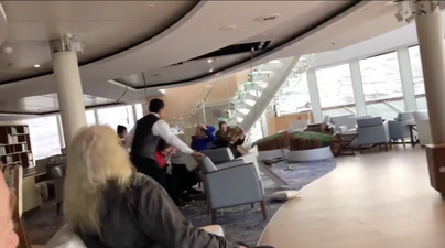 Norway cruise ship evacuated after rough seas send tables tumbling across deck