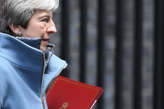 Theresa May leaving Downing Street ahead of Brexit votes in the House of Commons