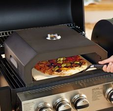 Aldi is selling an outdoor BBQ pizza oven for a bargain price