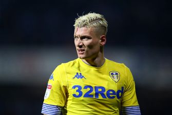 Leeds’ Ezgjan Alioski reacts angrily to being kissed by Pontus Jansson